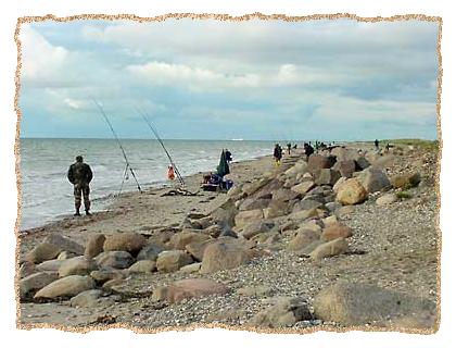 Angler am Strand